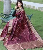 Maroon colour soft  silk saree with copper and golden zari weaved border and pallu