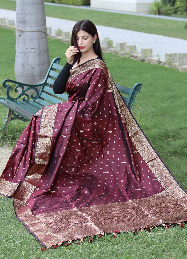 Maroon colour soft  silk saree with copper and golden zari weaved border and pallu