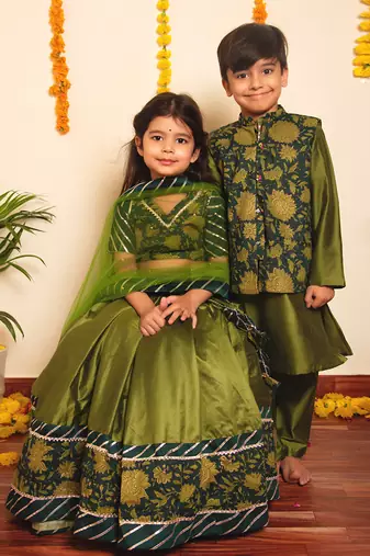 Bachapan idika green lehenga set