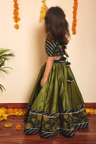 Bachapan idika green lehenga set