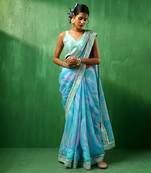 Adaa blue marble print organza saree