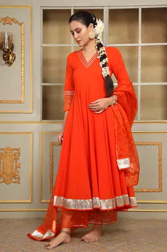 Saadgi orange mirror work anarkali set