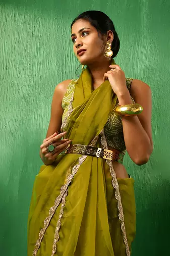 Adaa mehendi green organza saree