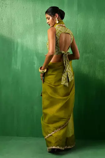 Adaa mehendi green organza saree