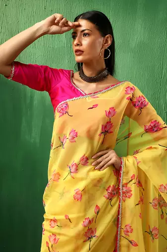 Adaa pink lotus yellow organza saree