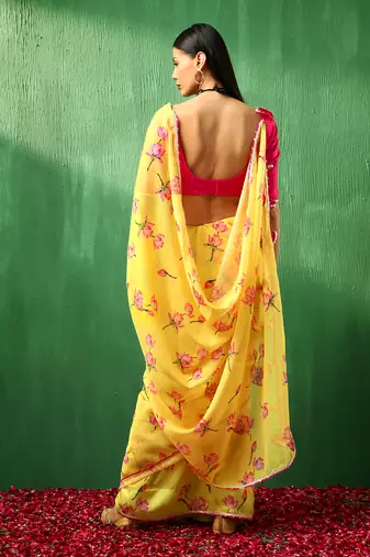 Adaa pink lotus yellow organza saree