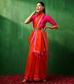 Adaa pink border orange organza saree