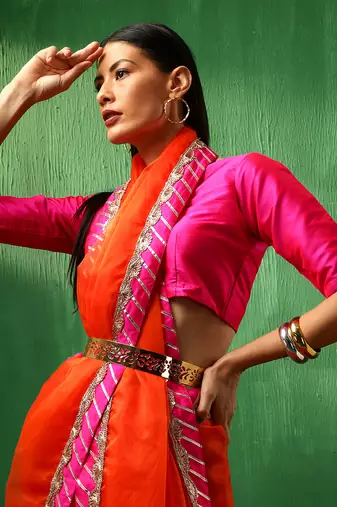 Adaa pink border orange organza saree