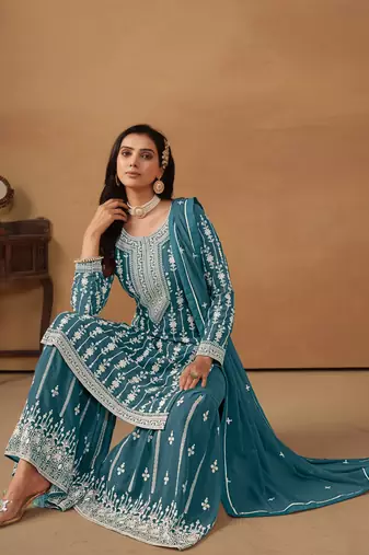 Teal embroidered faux georgette salwar suit