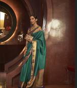 Green Faux Kanjivaram Silk Zari Weaving Border And Rich Pallu Saree With Blouse For Women