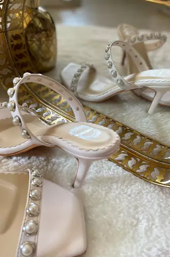 White pearly stilettos