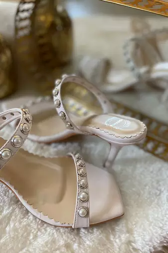 White pearly stilettos