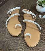 White embroidered flats