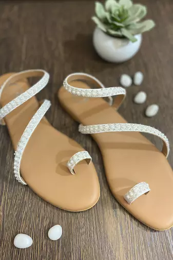 White embroidered flats