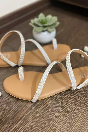 White embroidered flats