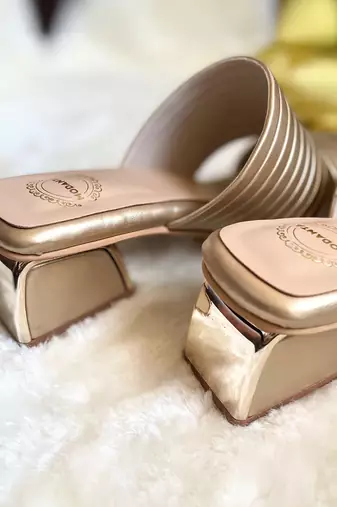 Gold pleated heels