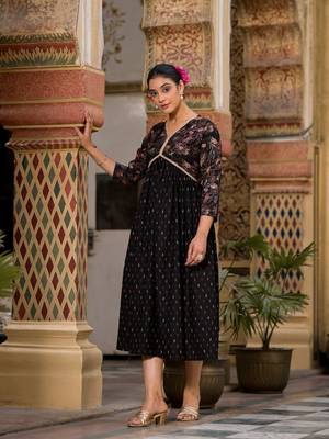 Beautiful girlish black colour rayon kurti with designer foil print for partywear 4