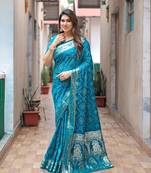 Firozi colour kanchi woven zari designer saree with traditional rajasthani bandhej print silk saree