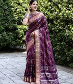 Ethnic And Stylish Purple Ikkat Patola Woven Silk Blend Saree For Party Looks