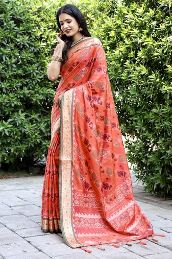 Ethnic And Stylish Orange Ikkat Patola Woven Designer Silk Blend Saree For Party Looks