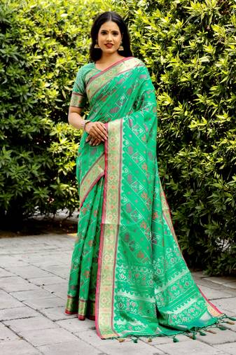 Ethnic And Stylish Rama Ikkat Patola Woven Designer Silk Blend Saree For Party Looks
