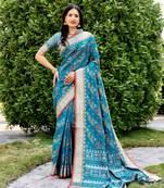 Ethnic And Stylish Blue Ikkat Patola Woven Silk Blend Saree For Party Looks