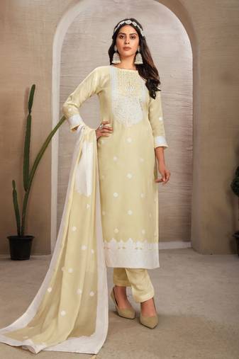 Sober and sophisticated beige colour organza fabric girlish festive wear ethnic suit