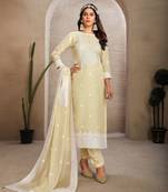 Sober and sophisticated beige colour organza embroidered girlish festive wear ethnic suit