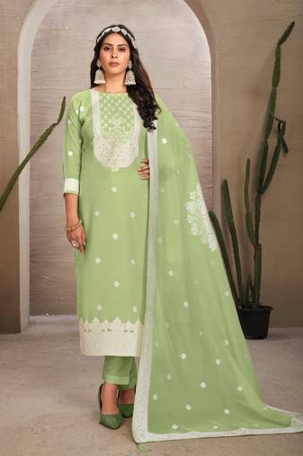 Sober and sophisticated pista colour organza fabric girlish festive wear ethnic suit