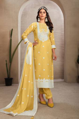 Sober and sophisticated yellow colour organza fabric girlish festive wear ethnic suit