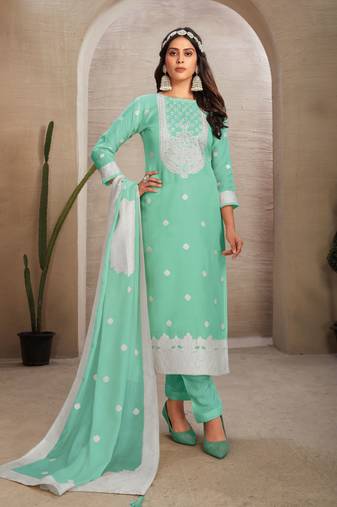 Sober and sophisticated sea green colour organza fabric girlish festive wear ethnic suit