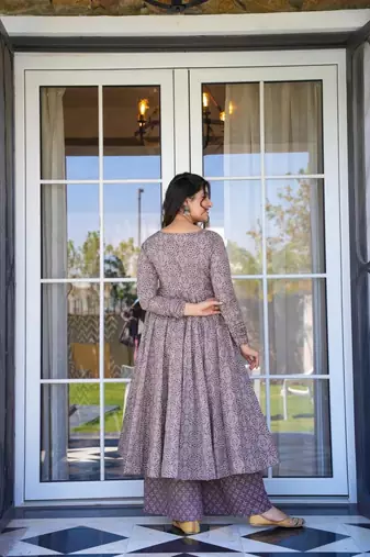 Beautifuly designed mauve colour cotton fabric ethnic and girlish trendy partywear dress