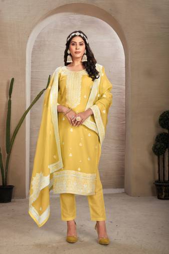 Yellow colour organza fabric ethnic resham embroidered festive wear salwar kameez