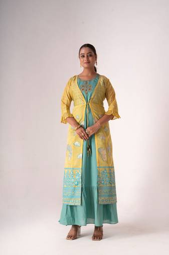 Mustard colour designer heavy wedding reception dress for perfect bridesmaid look