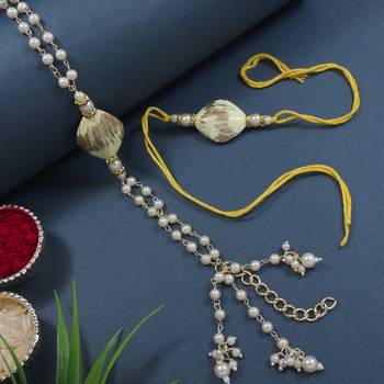 designer kundan pearl hanging bhaiya bhabhi lumba rakhi 1