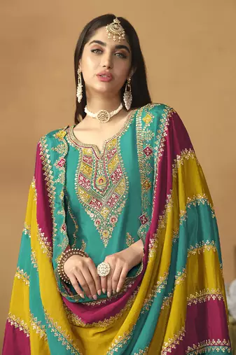 Faux georgette embroidered salwar suit in turquoise