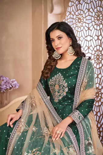 Green embroidered tapeta silk semi stitched anarkali suit