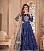 Navy blue embroidered tapeta silk semi stitched anarkali suit