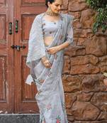 Grey colour pure shiny zari chiffon saree with cutowork and embroidory