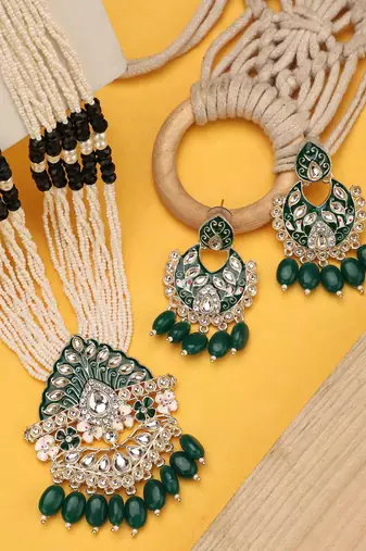 Anikas creation green jewellery set for timeless sophistication
