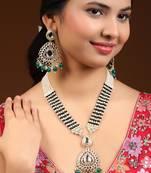 Anikas creation green jewellery set for a timeless statement