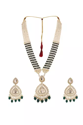 Anikas creation green jewellery set for a timeless statement