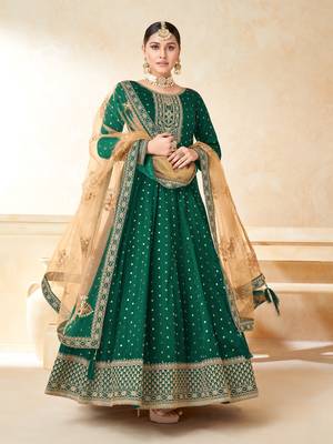 Green embroidered tapeta silk semi stitched anarkali suit 1
