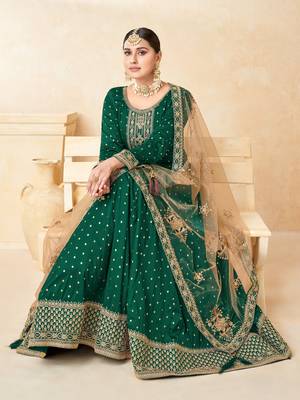 Green embroidered tapeta silk semi stitched anarkali suit 2