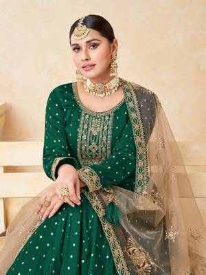 Green embroidered tapeta silk semi stitched anarkali suit 3