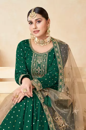 Green embroidered tapeta silk semi stitched anarkali suit