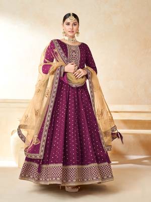 Purple embroidered tapeta silk semi stitched anarkali suit 1