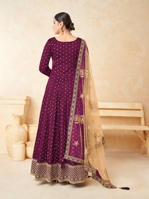 Purple embroidered tapeta silk semi stitched anarkali suit 2