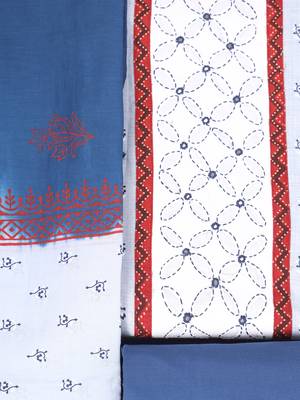 A light denim blue screen-printed unstitched suit set with a block-printed dupatta. 4