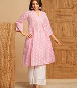 Flared kurta in woven cotton fabric with with gathering and hand embroidery.